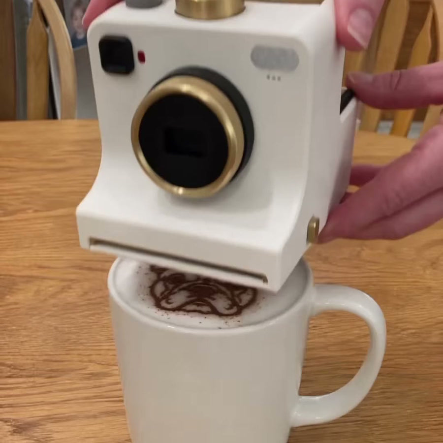 LATTECAM sitting on a mug of latte